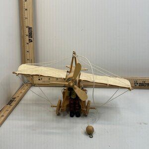 Vintage Wooden Flying Machine with Pilot Toy Handcrafted Airplane Propeller